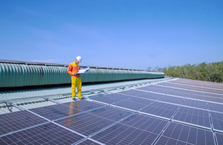 Solar Technician Installing Solar Panels